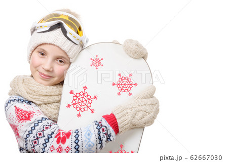 portrait of a happy young girl snowboarding portrait of a happy young girl snowboarding 62667030