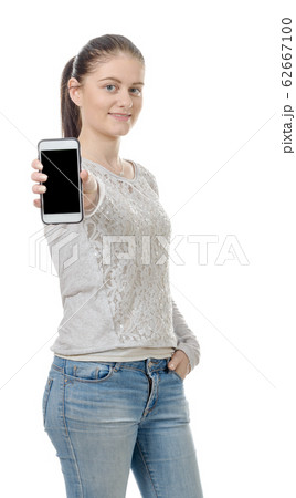 happy young woman showing blank smartphone screen happy young woman showing blank smartphone screen 62667100