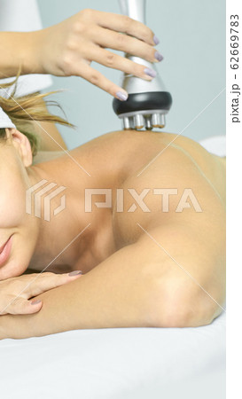 Perfect radio treatment. Woman at spa procedure. Perfect radio treatment. Woman at spa procedure. 62669783