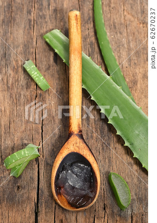 Aloe Vera Slices And Spoon With Aloe Gel 62670237
