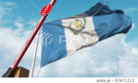 Barrier gate being opened with flag of Guatemala as a background. Guatemalan Free entry or lifting a ban. 3D rendering Barrier gate being opened with flag of Guatemala as a background. Guatemalan Free entry or lifting a ban. 3D rendering 62671212