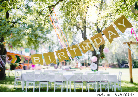A table set for kids birthday party outdoors in garden in summer. 62673147