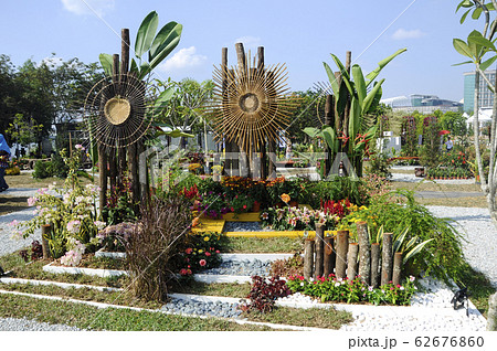 Small pocket garden made from mix of recycle material and flowers at Floria Garden, Putrajaya, Malaysia.    62676860