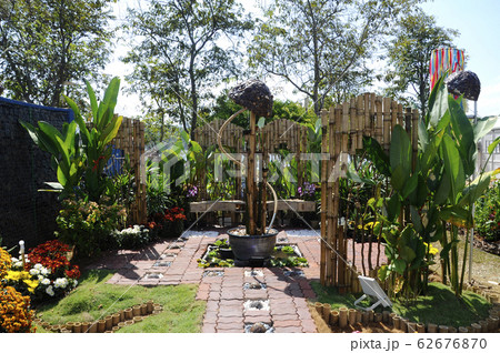 Small pocket garden made from mix of recycle material and flowers at Floria Garden, Putrajaya, Malaysia. Small pocket garden made from mix of recycle material and flowers at Floria Garden, Putrajaya, Malaysia. 62676870