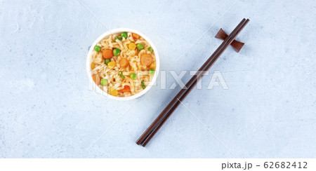 Ramen cup panoramic overhead shot, instant soba noodles in a plastic cup, with copy space Ramen cup panoramic overhead shot, instant soba noodles in a plastic cup, with copy space 62682412