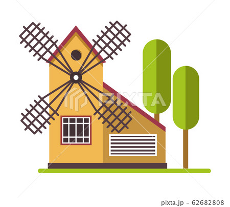 Windmill rural agicultural structure near trees at farm land 62682808