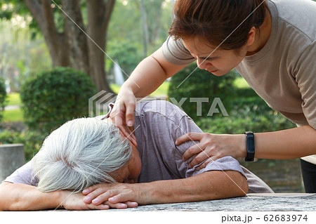 Sick asian senior woman fainted unconscious at the table, fall face down,elderly female patient stop breathing due to heart failure, cardiac arrest,severe arrhythmia, sudden unexpected death syndrome Sick asian senior woman fainted unconscious at the table, fall face down,elderly female patient stop breathing due to heart failure, cardiac arrest,severe arrhythmia, sudden unexpected death syndrome 62683974
