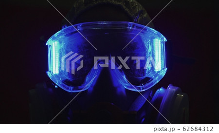 Man in protective costume suit, gas protect medical spray paint mask. Doctor in respirator. Concept health virus coronavirus epidemic. 62684312