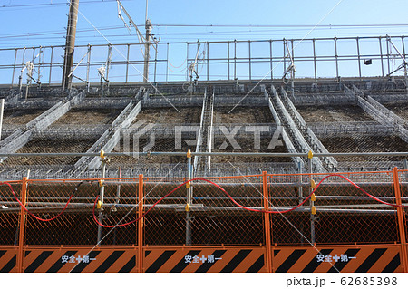 法面コンクリート打設基礎工事現場 法面コンクリート打設基礎工事現場 62685398