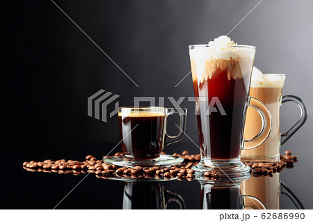 Coffee drinks and coffee beans on black 62686990