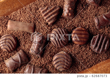 Chocolate candies and chocolate chips. Chocolate candies and chocolate chips. 62687073