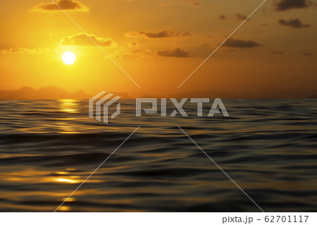 Sunset sky at the lake with dark clouds 62701117