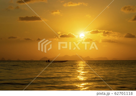 Sunset sky at the lake with dark clouds 62701118