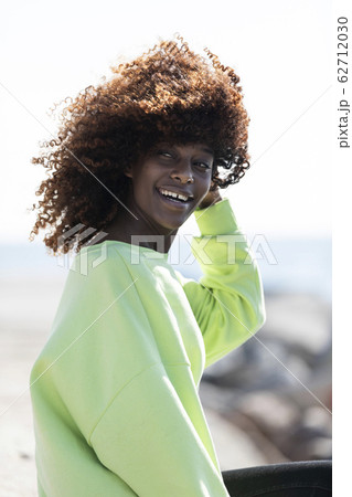 Portrait of a beautiful afro american woman Portrait of a beautiful afro american woman 62712030