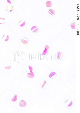 Pearl confetti on white background. 62713394