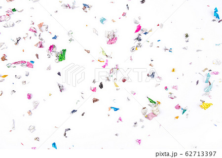 Multicolored confetti on white background. Multicolored confetti on white background. 62713397