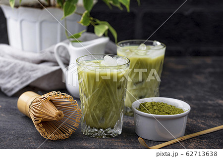 Cold matcha tea with milk and ice 62713638