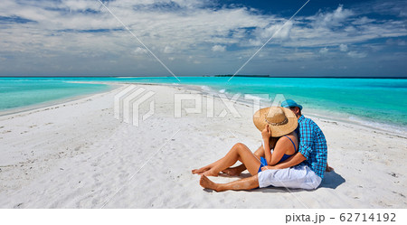 Couple in blue on a beach at Maldives 62714192