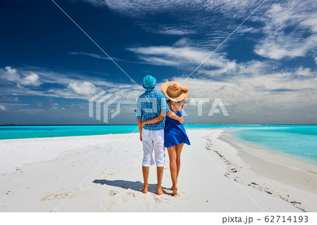 Couple in blue on a beach at Maldives 62714193