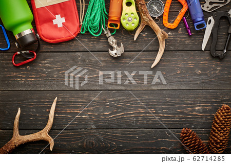 Travel items for hiking over wooden background Travel items for hiking over wooden background 62714285