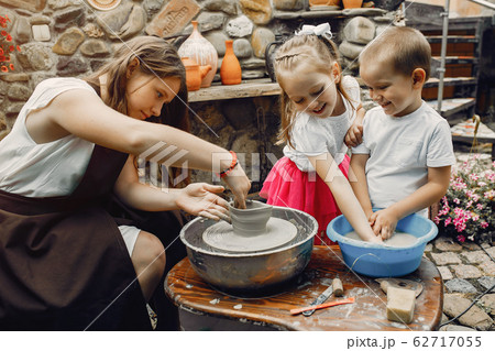 Young people make jug in pottery Young people make jug in pottery 62717055
