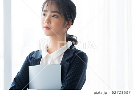 A business woman beside the window A business woman beside the window 62723637