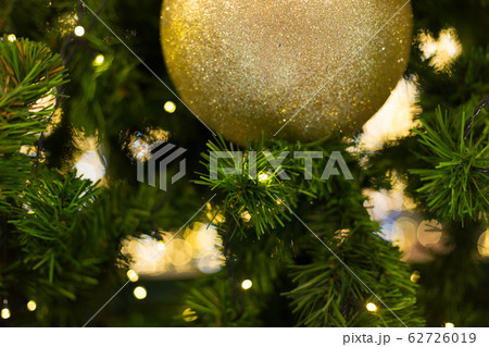 Golden christmas ball. Holiday background. Golden christmas ball. Holiday background. 62726019