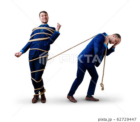 Tired businessman pulls tied himself with a rope. Tired businessman pulls tied himself with a rope. 62729447