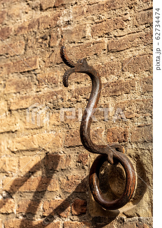 Old wrought iron ring to tie the horses - Bologna Italy 62734474