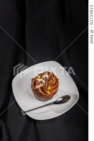 Brown cupcake top view Brown cupcake top view 62734623