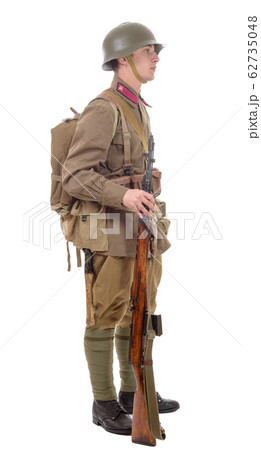 young Soviet soldier with rifle on the white young Soviet soldier with rifle on the white 62735048