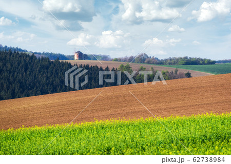 Picturesque rural landscape with old windmill Picturesque rural landscape with old windmill 62738984