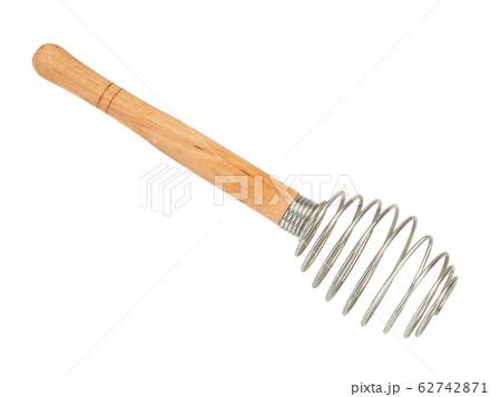 Houseware: steel whisk with wooden handle isolated on white background 62742871