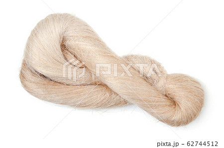 Raw flax fiber isolated on white. 62744512