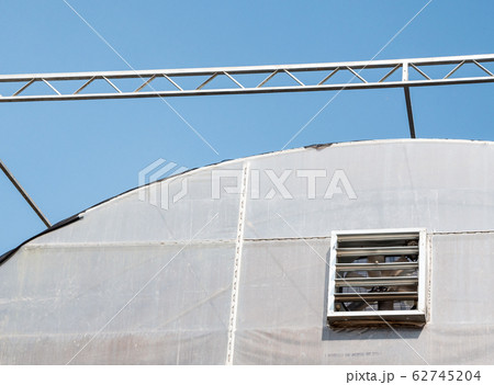 Large greenhouse building with the ventilators 62745204