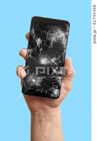 broken phone in the hand 62745498