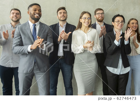 Grateful listeners. Happy business team applauding after seminar Grateful listeners. Happy business team applauding after seminar 62746473