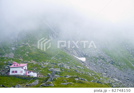 Lonely house in the valley Fagaras mountains. The Lonely house in the valley Fagaras mountains. The 62748150
