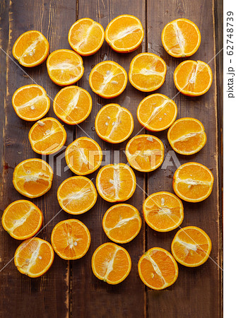 juicy halves of oranges 62748739