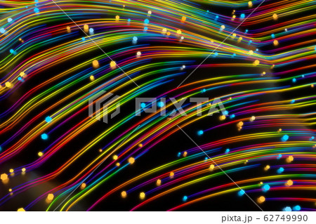 Neon glowing twisted cosmic lines on the glossy surface. Turbulence curls flow colorful motion. Fluid and smooth astronomy vortex swirl structure. 3d rendering Abstract creative modern background Neon glowing twisted cosmic lines on the glossy surface. Turbulence curls flow colorful motion. Fluid and smooth astronomy vortex swirl structure. 3d rendering Abstract creative modern background 62749990