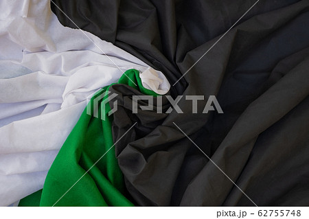 Cloth waves close up the background, Stacked Creased fabric, elegant wallpaper design, wavy folds of grunge silk texture satin velvet material Cloth waves close up the background, Stacked Creased fabric, elegant wallpaper design, wavy folds of grunge silk texture satin velvet material 62755748