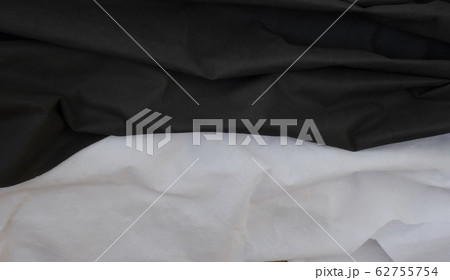 Cloth waves close up the background, Stacked Creased fabric, elegant wallpaper design, wavy folds of grunge silk texture satin velvet material 62755754