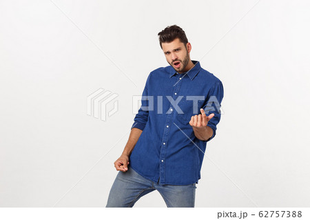 Portrait of an emotional young man dancing. Isolated over white background Portrait of an emotional young man dancing. Isolated over white background 62757388