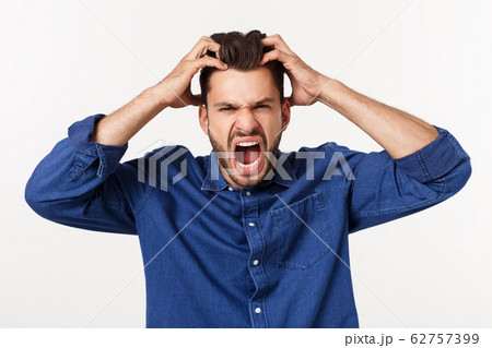 young office worker mad by stress screaming isolated on white. young office worker mad by stress screaming isolated on white. 62757399