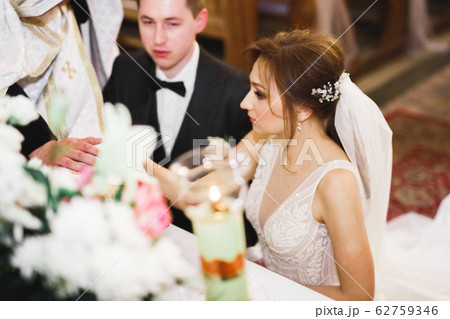 Wedding couple bide and groom get married in a church 62759346