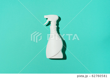 White plastic bottle of cleaning product, household chemicals or liquid laundry detergent on blue background. Top view. Flat lay. Copy space. Detergent bottle 62760581