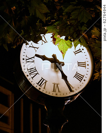 Lighted clock on the night street of Athens 62764944