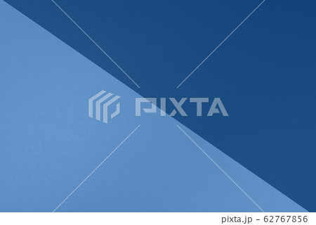 Background in trendy blue colors. Fashionable paper. Top view. Minimal concept. Trendy monochrome color 62767856