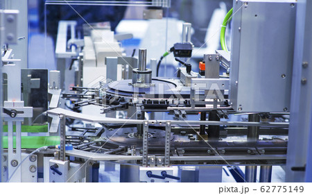 pharmaceutical industry. Production line machine conveyor at factory with bottles pharmaceutical industry. Production line machine conveyor at factory with bottles 62775149