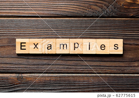 examples word written on wood block. examples text 62775615